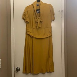 Retrolicious mustard bow tie dress